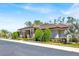 Single-story home with manicured landscaping and well-maintained lawn at 14740 Hartford Run Dr, Orlando, FL 32828