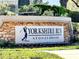 Yorkshire Run at Stoneybrook community sign with stone base and manicured landscaping at 14740 Hartford Run Dr, Orlando, FL 32828
