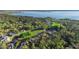 Aerial view of several waterfront homes along canal and a lake at 1475 Kettledrum Trl, Deltona, FL 32725