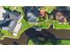 Aerial view of waterfront homes, docks, and a serene body of water at 1475 Kettledrum Trl, Deltona, FL 32725
