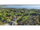 Aerial view of several waterfront homes along canal and a lake at 1475 Kettledrum Trl, Deltona, FL 32725
