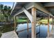 Boat dock showing the boat lift, canal access and supports of the structure at 1475 Kettledrum Trl, Deltona, FL 32725