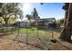 Charming home exterior with a well-kept lawn and white painted brick at 1475 Kettledrum Trl, Deltona, FL 32725
