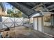 Garage interior featuring a storage area, concrete floors and white doors at 1475 Kettledrum Trl, Deltona, FL 32725