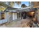Garage interior featuring storage areas, concrete floors and white doors at 1475 Kettledrum Trl, Deltona, FL 32725