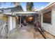 Covered garage with an interesting sign on the left wall at 1475 Kettledrum Trl, Deltona, FL 32725