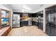 Well-equipped kitchen with stainless steel appliances, ample cabinetry, and a functional layout at 1475 Kettledrum Trl, Deltona, FL 32725