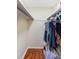 Walk-in closet with shelving and rods, offering ample storage space for an organized wardrobe at 1475 Kettledrum Trl, Deltona, FL 32725