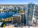 Stunning aerial view featuring a high rise condo, lake, and downtown cityscape at 150 E Robinson St # 1007, Orlando, FL 32801