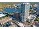 Aerial view of a luxury condominium complex next to a large lake with downtown views at 150 E Robinson St # 1007, Orlando, FL 32801
