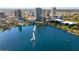 Scenic aerial view of a lake featuring a water fountain in a park-like city setting at 150 E Robinson St # 1007, Orlando, FL 32801