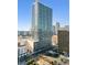 Modern high-rise building in an urban setting on a sunny day at 150 E Robinson St # 1007, Orlando, FL 32801