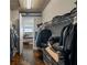 Spacious walk-in closet with custom shelving and ample storage leading to the primary bedroom at 150 E Robinson St # 1007, Orlando, FL 32801