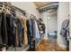 Spacious walk-in closet with custom shelving and ample storage, ready to be organized to your liking at 150 E Robinson St # 1007, Orlando, FL 32801