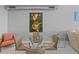 Bright dining area featuring a glass table, modern art and comfortable seating, perfect for entertaining at 150 E Robinson St # 1007, Orlando, FL 32801