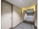 Hallway featuring carpet and neutral wall colors at 150 E Robinson St # 1007, Orlando, FL 32801