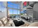 Beautiful living room featuring a spiral staircase and stunning waterfront views at 150 E Robinson St # 1007, Orlando, FL 32801