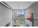 Bright living room with a spiral staircase, ceiling fan, and scenic views at 150 E Robinson St # 1007, Orlando, FL 32801
