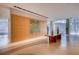 Lobby hallway featuring wood paneling and modern accents at 150 E Robinson St # 1007, Orlando, FL 32801