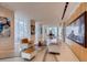 Spacious lobby area with contemporary furnishings, art, and terrazzo flooring at 150 E Robinson St # 1007, Orlando, FL 32801