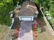 Overhead shot of a well-kept property featuring a manicured lawn and inviting curb appeal at 1505 25Th St, Orlando, FL 32805