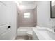 This bathroom features tile surround, a shower and tub combo, and a single sink at 1505 25Th St, Orlando, FL 32805