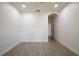 This bright bedroom features recessed lighting, neutral walls, and tiled flooring at 1505 25Th St, Orlando, FL 32805