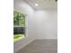 Bright bedroom showcasing a large window and tiled floors at 1505 25Th St, Orlando, FL 32805