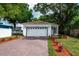 Charming single-story home with a brick driveway and beautifully landscaped front yard at 1505 25Th St, Orlando, FL 32805