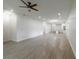 This spacious living room features recessed lighting, tile flooring, and a ceiling fan at 1505 25Th St, Orlando, FL 32805