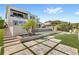 Expansive backyard with water feature, manicured lawn, and a sense of privacy at 15633 Panther Lake Dr, Winter Garden, FL 34787