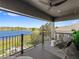 Expansive balcony with lake views, seating, and decorative accents for outdoor enjoyment at 15633 Panther Lake Dr, Winter Garden, FL 34787