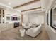 Cozy living room with stylish furnishings, built-in cabinets, and nearby beverage cooler at 15633 Panther Lake Dr, Winter Garden, FL 34787