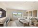 Bright living room with lake views and a comfortable seating area for relaxation and socializing at 15633 Panther Lake Dr, Winter Garden, FL 34787