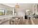 Bright home office featuring a large desk, built-in storage, and plenty of natural light at 15633 Panther Lake Dr, Winter Garden, FL 34787