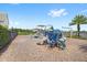 A community playground features modern play equipment and a secure fenced perimeter at 15633 Panther Lake Dr, Winter Garden, FL 34787