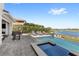Inviting pool and spa area with lake views, perfect for relaxation and entertaining at 15633 Panther Lake Dr, Winter Garden, FL 34787