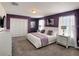 Spacious main bedroom with ample natural light, neutral tones, and contemporary furnishings at 1673 Moon Valley Dr, Davenport, FL 33896
