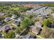 Residential area showcasing diverse housing options, green spaces, and well-maintained landscaping at 1913 Lazy Oaks Loop, St Cloud, FL 34771