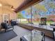 Enjoy this screened patio with room for dining and grilling while overlooking the spacious backyard at 1913 Lazy Oaks Loop, St Cloud, FL 34771