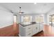 Kitchen with hardwood floors, a breakfast bar, and stainless steel appliances at 1960 Evard Ave, Deltona, FL 32725