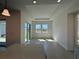 The dining area features a modern tray ceiling and access to backyard with sliding glass doors at 2010 Divot Dr, Daytona Beach, FL 32124