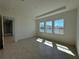 Bright office space with three windows and tile floors at 2010 Divot Dr, Daytona Beach, FL 32124