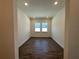 Bonus room with tile flooring, bright lighting, and windows at 2013 Divot Dr, Daytona Beach, FL 32124