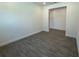 Spacious room with tile flooring, white trim, and neutral walls at 2013 Divot Dr, Daytona Beach, FL 32124