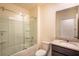Bathroom featuring a shower over tub, granite countertop, and tiled floor at 2464 Ribbon Fall Ave, Davenport, FL 33837