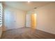 Bright bedroom with neutral carpet, closet and doorway entrance at 2464 Ribbon Fall Ave, Davenport, FL 33837