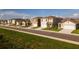 New home construction street view with a variety of color schemes at 2464 Ribbon Fall Ave, Davenport, FL 33837