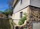 Exterior image of the home that features both stone and traditional siding accents at 2652 Ravenall Ave, Orlando, FL 32811