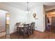 Cozy dining area with wood floors and a chandelier light at 2935 Apaloosa Trl, Deltona, FL 32738